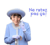 a woman in a blue coat and hat holds a cane and says ne ratez pas ca