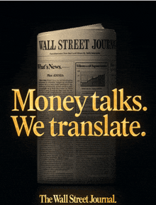 a newspaper that says wall street journal on it