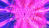 a silhouette of a person is standing in a purple and blue tunnel