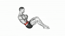 a man is sitting on the floor doing a crunch exercise with his hands on his stomach .