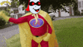 a cartoon character is wearing a red and yellow superhero costume and a yellow cape .