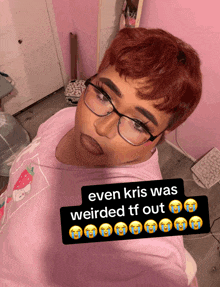 a woman wearing glasses and a pink shirt with the words even kris was weirded tf out on it