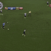 a soccer game is being played in a stadium sponsored by coca cola