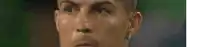 a close up of a man 's face with a tear coming out of his eye