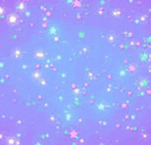 a purple background with a lot of stars and glitter on it