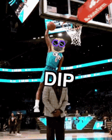 a basketball player wearing a spongebob costume is jumping in the air with the word dip written above him