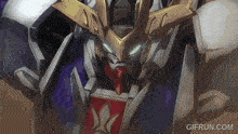 a close up of a robot with the website gifrun.com written below it