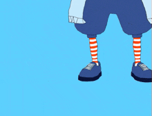 a cartoon drawing of a clown wearing a white shirt with a red bow on it
