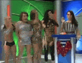 a group of people are standing around a podium with a phone in it