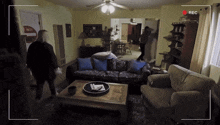 a recording of a living room with a rec button
