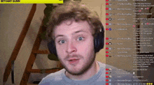 a man wearing headphones is sitting in front of a screen that says bethany gunn .