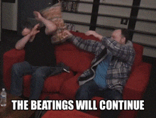 two men sitting on a red couch with the words " the beatings will continue " on the bottom
