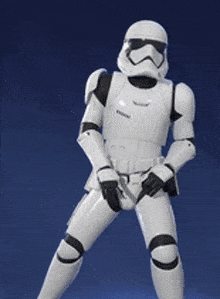 a storm trooper from star wars is making a rock sign