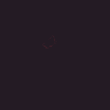 a blurry picture of a man wearing a red hat and a white shirt .