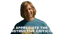 a man wearing a blue shirt that says " i appreciate the constructive criticism "