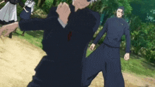a group of anime characters are standing on a dirt path in the woods .