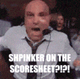 a man in a white shirt and tie is screaming with the words " shpinker on the scoresheet ? ! ? ! "