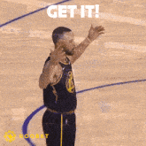 a basketball player is giving a thumbs up and says get it