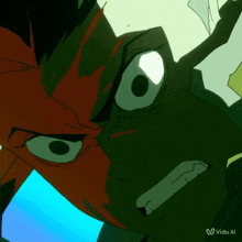 a close up of a cartoon character 's face with the words " vido al " on the bottom right