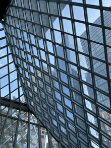 a building with a lot of windows and a blue sky behind it