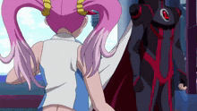 a girl with pink hair is standing next to a man in a black and red suit