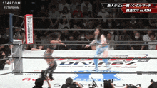 two women wrestling in a ring that says stardom on the bottom