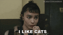 a woman says i like cats in a movie scene