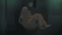 a man is holding a woman in his arms