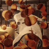 a person is surrounded by a bunch of acorns in a video game