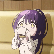 a little girl with purple hair is drinking from a white cup .