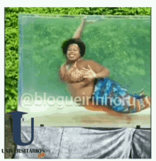 a picture of a woman in a bikini swimming in a clear container with the letters u on it