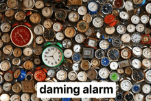 a bunch of clocks on a wall with the word " daming alarm " in the corner