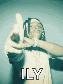 a man with dreadlocks is giving the middle finger with the word ily below him
