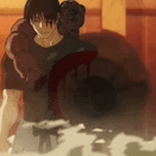 a man in boxing gloves is standing next to a giant monster in a room .