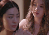two women are looking at each other and the words lingeriewoifss are on the bottom of the image