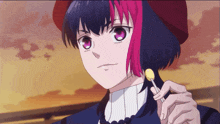 a girl with purple hair is holding a yellow lollipop in her hand