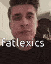 a close up of a man 's face with the words fatlexics written on the bottom .