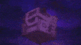 a close up of a purple and white object with a purple background .