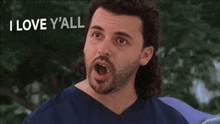 a man with a mullet and beard is saying `` i love y'all very much peace out '' .