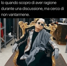 a man wearing sunglasses is sitting in a chair with the caption lo quando scopro di aver ragionie