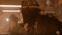 Chicago Fire Firefighter GIF - Chicago Fire Firefighter Searching GIFs