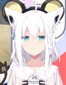 a girl with white hair and blue eyes wearing a headband with mouse ears