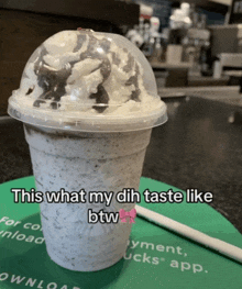 a starbucks milkshake with whipped cream and chocolate sauce on top