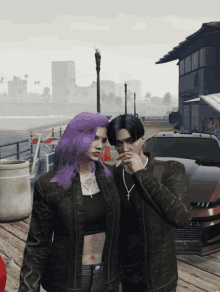 a man and a woman standing next to each other smoking a cigarette