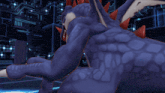 a blue dragon with red spikes is laying down in a room