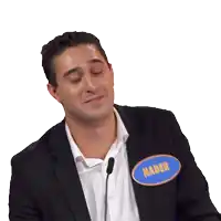 a man wearing a name tag that says nader
