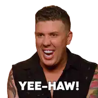 a man with tattoos on his arms says yee-haw
