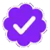 a purple cloud with a white check mark in it .