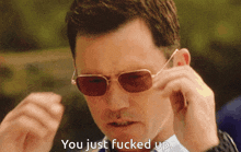 a man wearing sunglasses says " you just fucked up " at the bottom