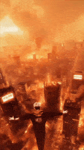 a man is flying through the air over a city on fire